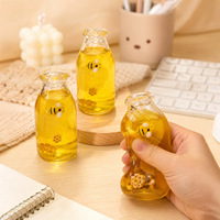 Jouet anti-stress souple en TPR de 10 cm en forme de bouteille de miel, simulation de boisson au miel, rebond rapide, fait main