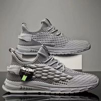 Nouvelles baskets tendance pour hommes, décontractées, sportives, à lacets, en maille souple et respirante, style Coconut, polyvalentes, grandes tailles, noires