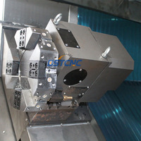 Machine de tournage CNC horizontale à lit incliné TCK550, très demandée, avec système de contrôle GSK et alimentateur automatique de barres servo
