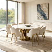 Ensemble de table à manger ronde en marbre avec base en métal doré et chaises en cuir crème pour salle à manger de villa