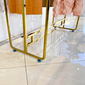 Wholesales Floor Double Clothes <strong>Hanging</strong> Rail Stand Shelves Metal <strong>Frame</strong> Garment Stand Middle for Stores Gold Clothing <strong>Rack</strong> - Product Image 5