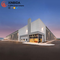 Entrepôt en acier de qualité supérieure pour parc industriel, poutre en H Q355B laminée à chaud avec certification CE et conception pour charges de vent