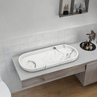 Plateau de service ovale personnalisé effet marbre, fabricant OEM de polyrésine, plateau de vanité pour salle de bain d'hôtel pour articles de toilette
