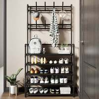 Porte-vêtements et sacs sur pied pliable à quatre à cinq niveaux pour chambre à coucher