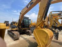 Excavatrice CAT 312D d'occasion en excellent état, faible usage, capacité de godet de 0,52 m³, moteur puissant de 72 kW, vente flash