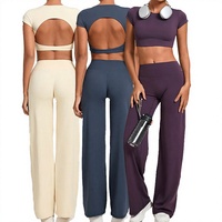 Ensemble de yoga léger et uni pour femme, deux pièces : T-shirt court à manches courtes et dos évidé, et pantalon large taille haute coupe ample en nylon