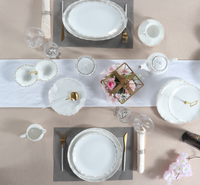 Service de table royal vaisselle en céramique fabriquée en Chine assiettes à dîner végétales bols nordiques service de table de luxe vaisselle blanche et argentée