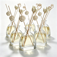 Flacon d'aromathérapie en verre transparent de luxe personnalisé de 100 ml avec bâtonnets diffuseurs et impression sérigraphique