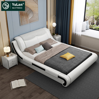La chambre à coucher moderne d'hôtel de stockage de lit de reine place les lits doubles en cuir simples de luxe