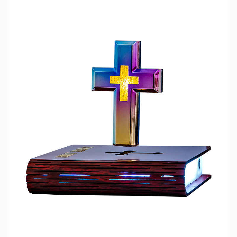 Book base levitating colorful cross