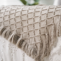 Großhandel Einfarbige Boho Quasten-Fransen-Decke Leichte Atmungsaktive Diamant-Waffelstruktur Strickdecke OEM für Wohndekor