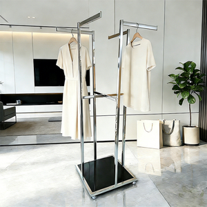Moderno Perchero de Acero Inoxidable de 4 Brazos con Base de Mármol, Soporte Ajustable para Exhibición de Ropa en Tiendas Minoristas - Product Image 1