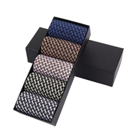 Chaussettes d'affaires personnalisées en gros pour hommes, couleur unie, antibactériennes, en mélange de coton doux tricoté, pour usage quotidien au bureau