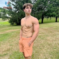 Vente en gros de shorts de plage pour hommes avec personnalisation OEM pour séchage rapide logo et taille personnalisés shorts en nylon respirants pour hommes