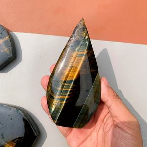 Vente en gros de pierres de cristal œil de tigre bleu et jaune en forme de larme, avec des inclusions et des cavités cristallines, pierre polie pour la décoration de la maison et du bureau - Product Image 2