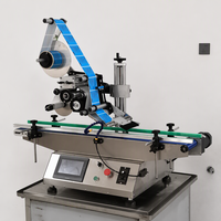 Machine d'étiquetage automatique pour surfaces planes, bouteilles, sacs en plastique, livres, sachets souples et emballages cosmétiques