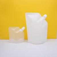 30ml 50ml 100ml pochettes en plastique thermoscellées avec logo personnalisé pochette à bec pour purée alimentaire réutilisable pour bébé