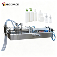 Remplisseuse de liquides à piston à double buse pour la production de petites séries de miel, de sirop et de liquide lessive