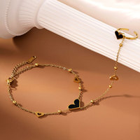 Bracelet en acier inoxydable doré avec anneau en forme de cœur noir tendance