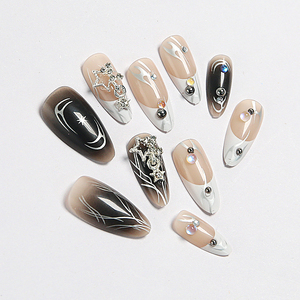Faux ongles à presser 3D en amande, tendance, noirs et nude, avec French manucure, étoiles et strass, et colle – Vente en gros - Product Image 2