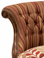 Fauteuil capitonné antique avec dossier rayé, assise à motif de feuilles botaniques, garniture à clous en laiton et pieds tournés sculptés