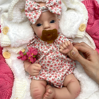 Poupée Reborn entièrement en silicone 17 pouces fille avec sucette yeux brillants bébé réaliste pour les accessoires éducatifs d'affichage de collectionneurs