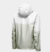 Veste à capuche bicolore bleu glace et violet, poche zippée sur le bras, poches latérales zippées, coupe-vent technique color block