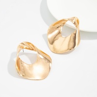 Boucles d'oreilles clous torsadées en métal ajouré motif floral pour femmes, accessoires de mode quotidiens, bijoux fantaisie, cadeaux