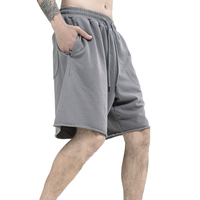 Shorts de survêtement décontractés pour hommes, couleur unie, en molleton épais de coton et polyester, coupe ample, ourlet brut, style oversize