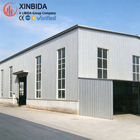 Bâtiment d'entrepôt en structure métallique, bâtiment métallique préfabriqué pour centre de distribution industriel et stockage de marchandises en vrac