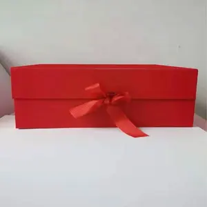 Boîte cadeau pliante imprimée en noir rose bleu orange blanc avec nœud de ruban décoratif pour festival