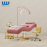 Table de massage multifonctionnelle moderne Union Win pour salon de beauté, en cuir PU, base en métal doré, pliable, lit incurvé pour extensions de cils
