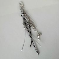 Chaîne de sac et de téléphone Y2K tendance, porte-clés punk en plastique noir et argenté, avec cordon tressé en os de serpent et pendentif perle