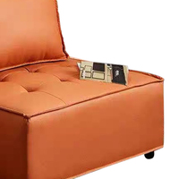 Canapé modulaire en PU orange avec coussin capitonné individuel, oreiller de dossier assorti et appui-tête, design combinable détachable pour salon