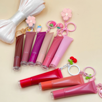 Marque privée Baume À Lèvres Hydratant Glitter Squeeze Lip Glaze Vegan Porte-clés Baume À Lèvres Brillant À Lèvres Hydratant Peptide Teinte À Lèvres