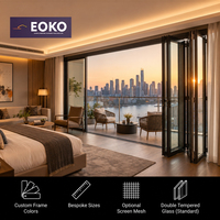 Porte accordéon en aluminium EOKO CE de qualité professionnelle pour suite de luxe d'hôtel CBD, chambre et balcon vue sur le rivière au coucher du soleil