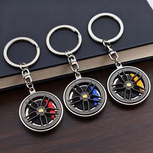 พวงกุญแจโลหะหมุนได้แบบขายส่ง สำหรับโปรโมชั่น ตกแต่งด้วยล้อดูดซับแรงกระแทก รูปทรงเทอร์โบรถยนต์ เหมาะสำหรับเป็นของขวัญ - Product Image 1