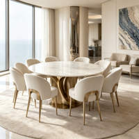 Ensemble de table à manger ronde en marbre avec base en métal doré et chaises en cuir crème pour salle à manger de villa
