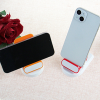 Vente en gros pas cher support de téléphone portable ABS flexible couleur bonbon réglable support de téléphone portable vitrine support de téléphone portable