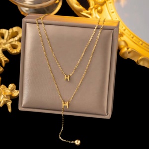 Collar ZYO de Moda para Mujer, en Acero Inoxidable con Baño de Oro de 18k, con Colgante de Zirconia en Forma de Concha, Trébol, Cruz, Mariposa, Letra y Corazón - Product Image 5
