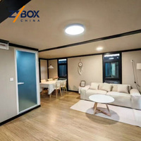 ZYBOX A1 Maison Modulaire Ignifugée à Deux Étages Conteneurisée avec Cadre Noir Préfabriqué # 1 Vendeur mondial Livraison en 10 jours Maison duplex