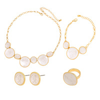 Ensemble de bijoux tendance en alliage émaillé blanc au design original et irrégulier : bracelet, collier, boucles d'oreilles et bague pour femme, idéal pour les rendez-vous et le quotidien
