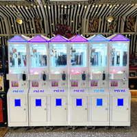 Mini attrape-poupée de bonbons à pièces d'arcade de machine à griffes avec de mini animaux en peluche en métal durable langue anglaise