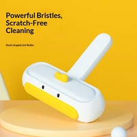Brosse anti-poils pour animaux en PP, grattoir à poils flottants, design petit canard, fournitures pour chats, best-seller transfrontalier