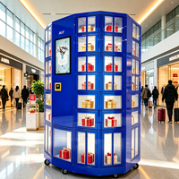 Kiosque distributeur transparent AIT, machine distributrice commerciale de boîtes surprises, idéale pour les terminaux aéroportuaires