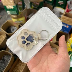 Creative Gifts Cartoon Cat Puppy Paw Shape PU Leather <b>pet</b> hair <b>memorial</b> storage bag Dog Hair Collector - Product Image 3