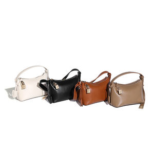 Vendita calda da <span class=keywords><strong>donna</strong></span> <span class=keywords><strong>borsa</strong></span> a <span class=keywords><strong>tracolla</strong></span> in <span class=keywords><strong>pelle</strong></span> vegana piccola alla moda di colore nero Low MOQ all'ingrosso con spalla in PU borse a <span class=keywords><strong>tracolla</strong></span> da <span class=keywords><strong>donna</strong></span> - Product Image 1