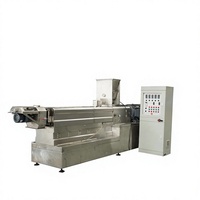 Machine d'extrusion pour la transformation des morceaux de soja et la fabrication d'aliments extrudés