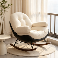 Fauteuil à bascule Egg Shell au design moderne, chaise longue en PU noir, tissu capitonné crème, support métallique double triangle