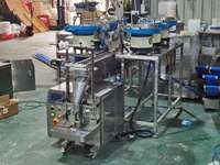Machine de comptage et d'emballage multi-spécifiques avec bol vibrant pour la production de pochettes mixtes de joints toriques en caoutchouc, de garnitures et de petites vis pour meubles